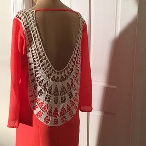 Orange dress with stunning cutout back!